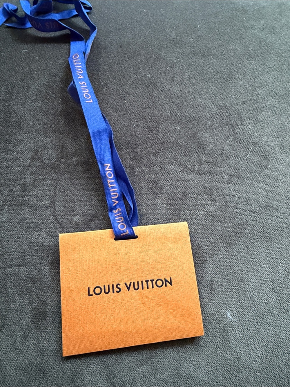 Louis Vuitton Orange Card with Blue Branded Ribbon